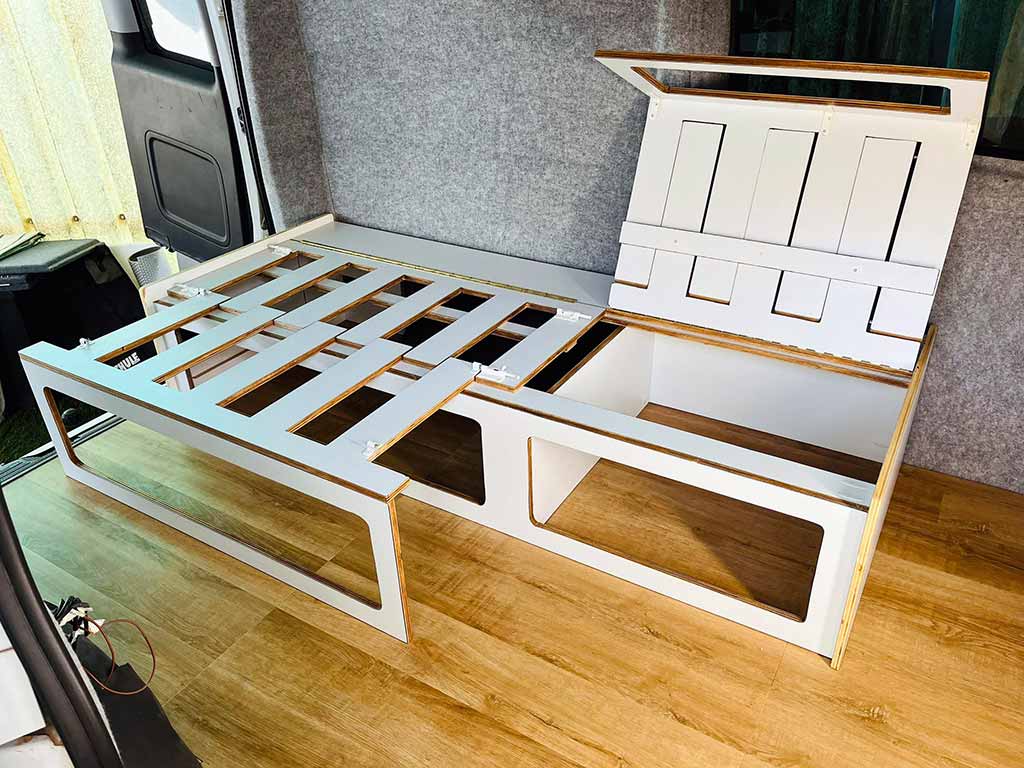 Extendable camper van bed system in compact folded position