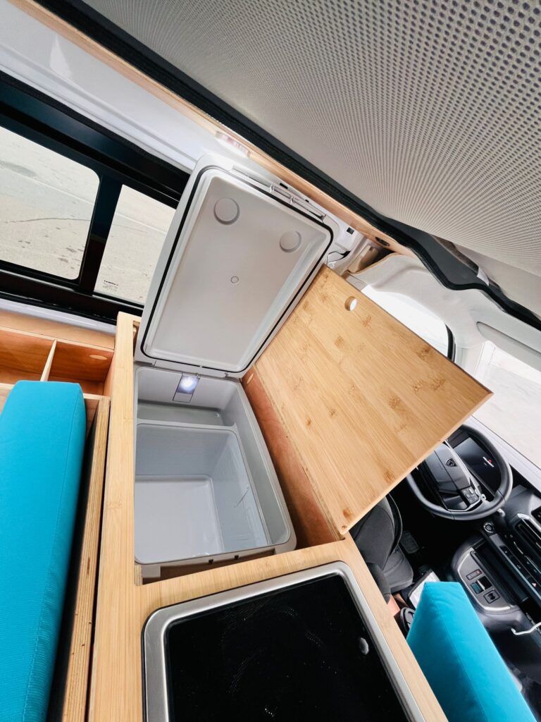 Custom Peugeot camper conversion with elevating roof